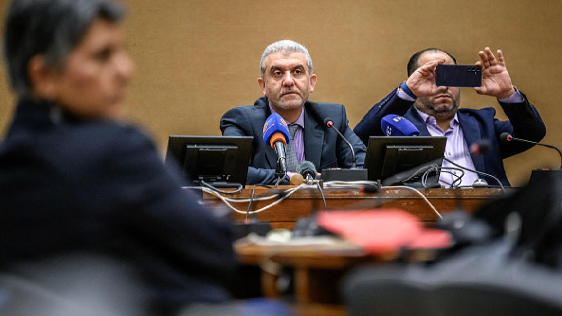 Lebanon Labour Minister Mustafa Bayram (C) during a press conference after filing a complaint to the ILO against Israel over the pager and walkie-talkie attacks carried out in last September, in Geneva on November 6, 2024. (FABRICE COFFRINI/AFP)