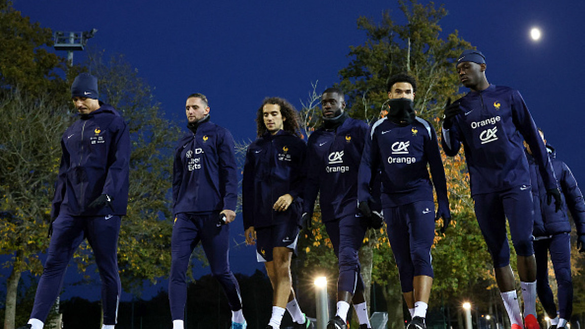 (L-R) defender #17 WIlliam Saliba, France's midfielder #14 Adrien Rabiot, France's midfielder #8 Matteo Guendouzi, Fance's defender #04 Dayot Upamecano, France's midfielder #18 Warren Zaire Emery and France's forward #12 Randal Kolo Muani arrive to attend a training session in Clairefontaine-en-Yvelines on November 11, 2024 as part of the team's preparation for upcoming UEFA Nations League qualifying matches against Israel and Italy.