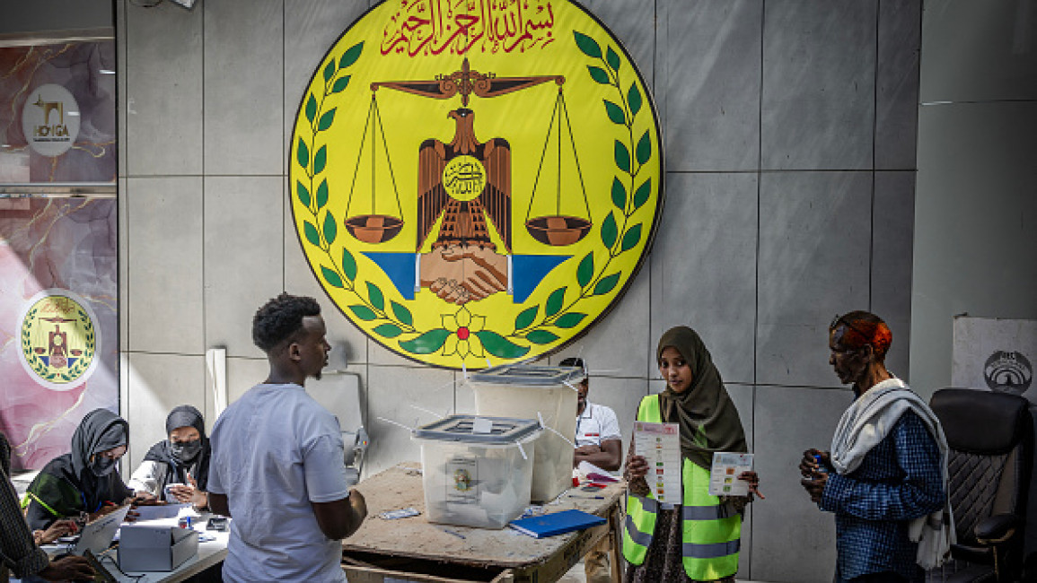 Somalliland National Electoral Commission (SNEC) officials monitor the voting process at a polling station during the 2024 Somaliland presidential election in Hargeisa on November 13, 2024. 