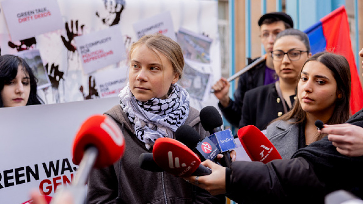 Swedish climate activist Greta Thunberg (21) holds a COP29 protest "Stop Greenwashing Genocide" outside of the UN Armenia office in Yerevan Armenia on 15 November 2024. Thunberg condemned the holding of the COP29 summit in Baku claiming that the international community has allowed Azerbaijan to "greenwash" ethnic cleansing in Nagorno-Karabakh and other human rights abuses such as crimes against Armenians and "crackdown on civil society."