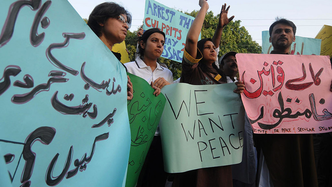 Ahmadis protest [Getty]