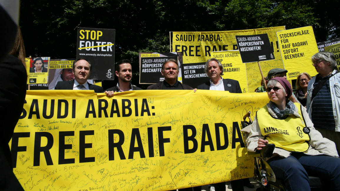 amnesty raif badawi protest berlin pacific press